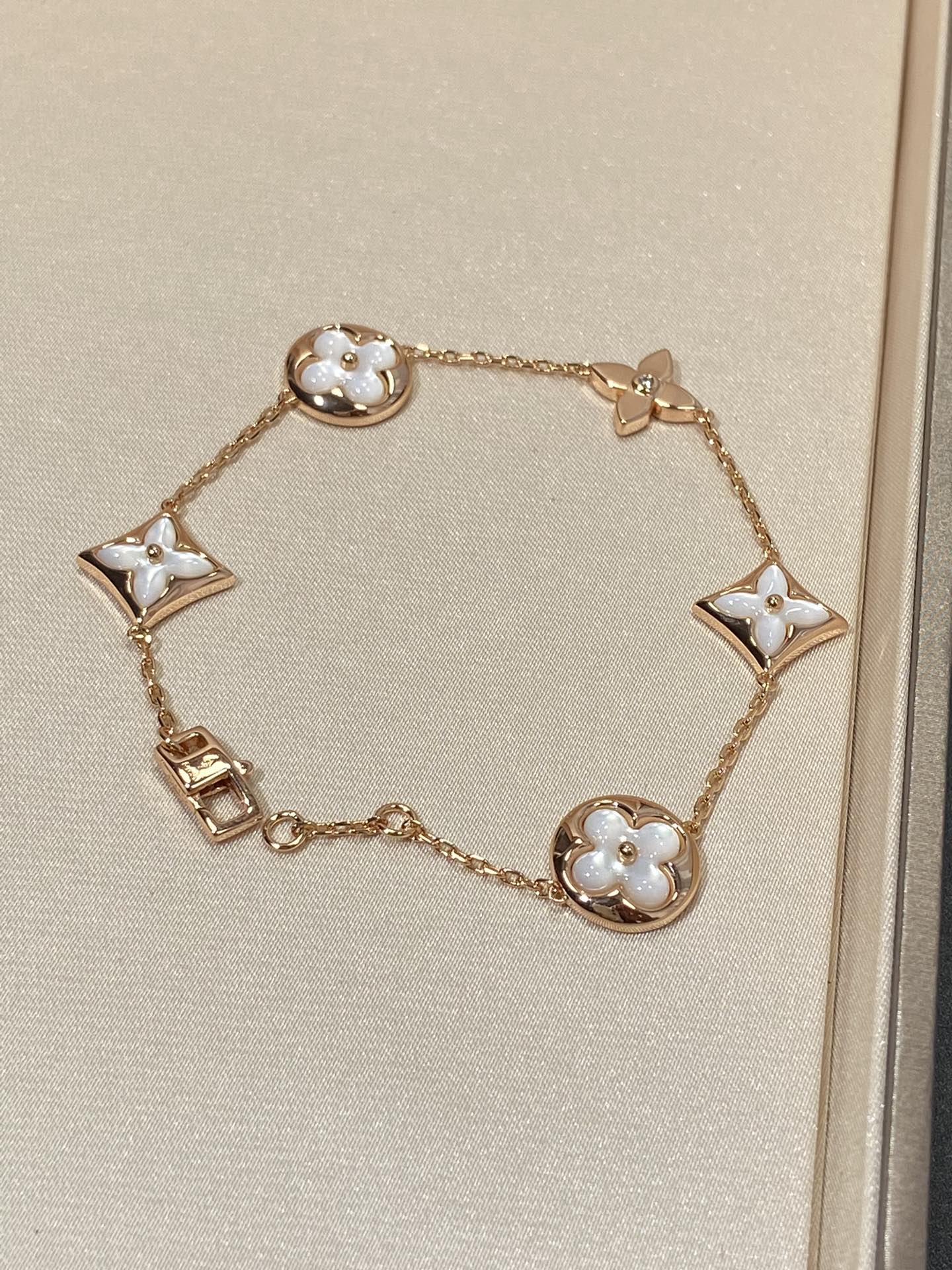 [Polaidi Jewelry]STAR AND SUN 5 MOTIF MOP PINK GOLD BRACELET