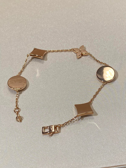 [Polaidi Jewelry]STAR AND SUN 5 MOTIF MOP PINK GOLD BRACELET