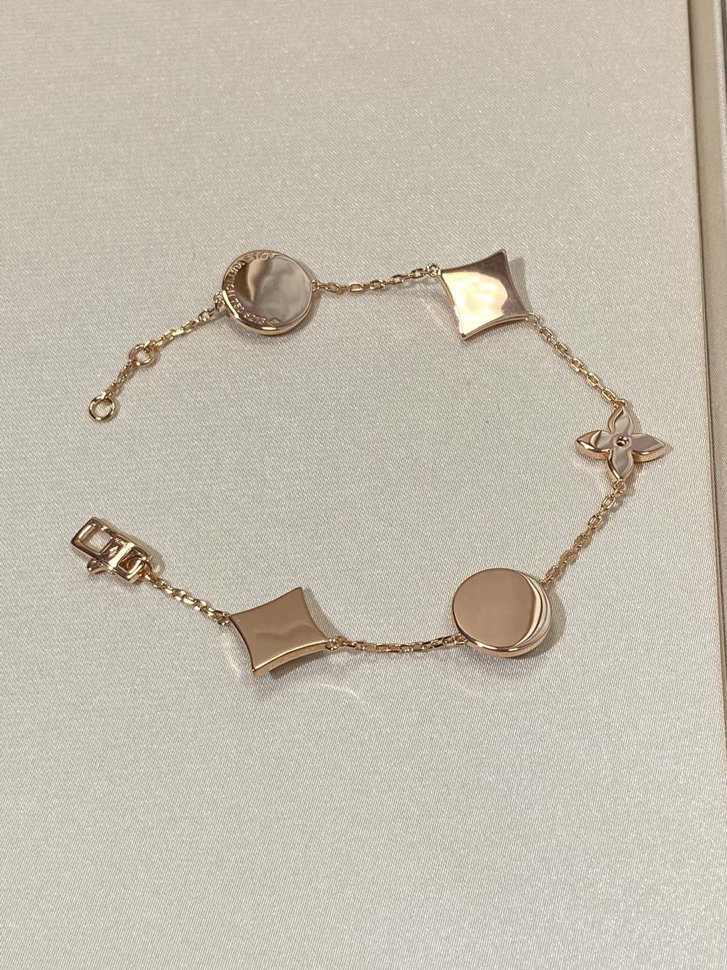 [：Polaidi Jewelry]STAR AND SUN 5 MOTIF MOP PINK GOLD BRACELET